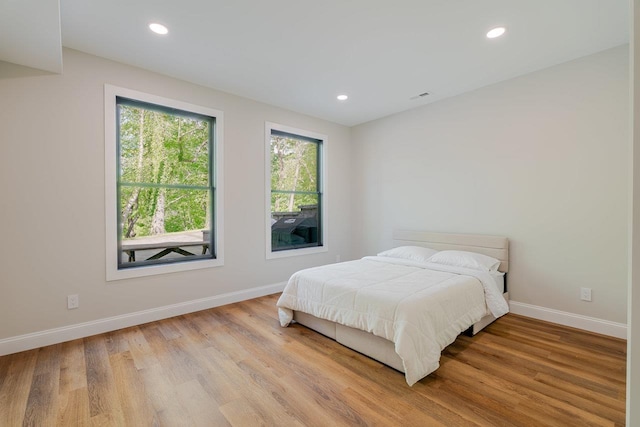 10 Samuel Bears Rd, Weyers Cave, VA 24486 - bedroom featuring baseboards, wood finished floors, and recessed lighting