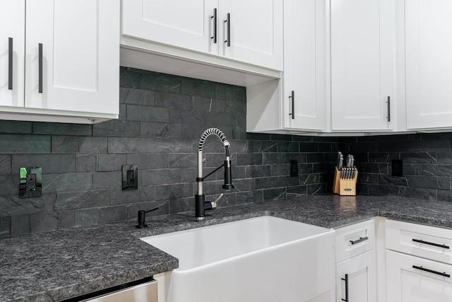 10 Samuel Bears Rd, Weyers Cave, VA 24486 - kitchen with a sink, white cabinets, backsplash, and dark stone countertops