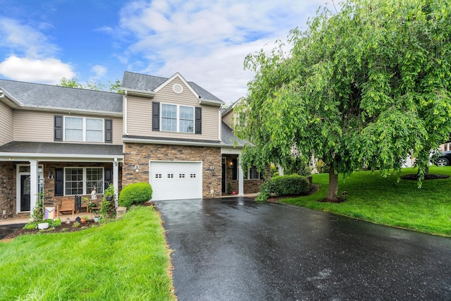 47 Villa View Dr, Staunton, VA 24401 - view of front facade featuring driveway, a front yard, a garage, a porch, and stone siding