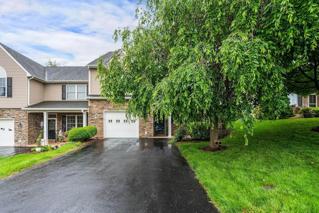 47 Villa View Dr, Staunton, VA 24401 - view of front of house featuring driveway, a garage, a front lawn, and stone siding