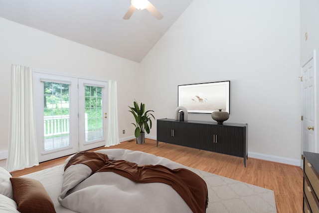 47 Villa View Dr, Staunton, VA 24401 - living room with high vaulted ceiling, light wood finished floors, a ceiling fan, and baseboards