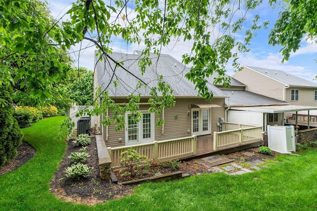 47 Villa View Dr, Staunton, VA 24401 - back of property with roof with shingles, a wooden deck, and a lawn