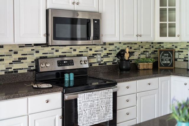 47 Villa View Dr, Staunton, VA 24401 - kitchen with stainless steel appliances, white cabinets, and dark countertops