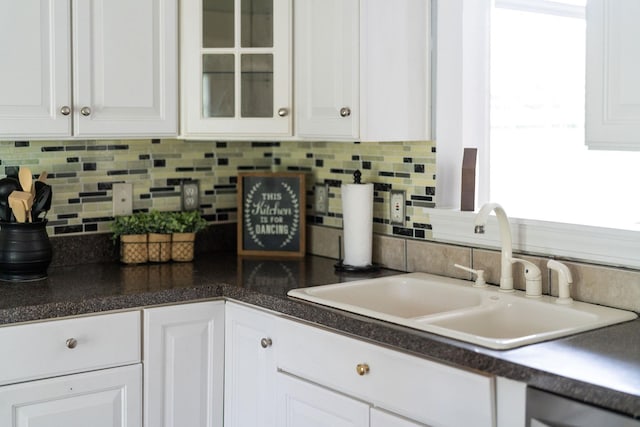 47 Villa View Dr, Staunton, VA 24401 - kitchen featuring a sink, backsplash, and white cabinets