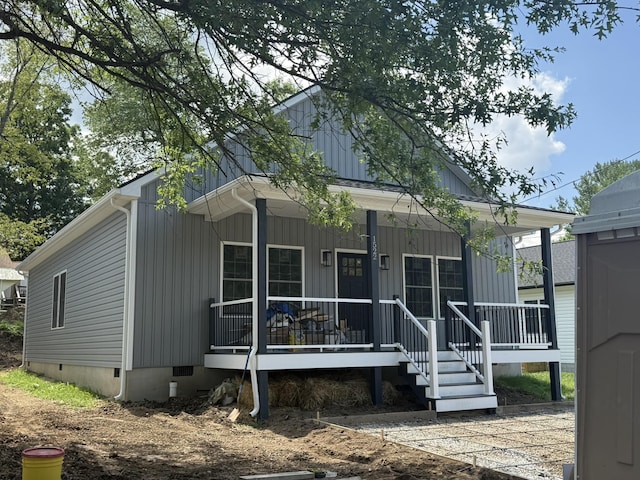 1522 2nd St, Waynesboro, VA 22980 - view of front facade featuring crawl space, a porch, and board and batten siding