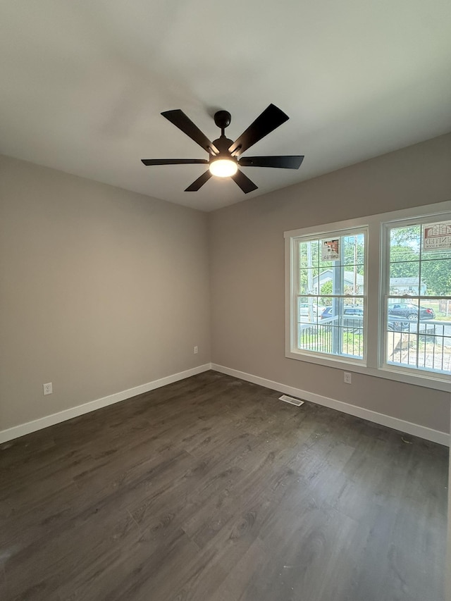 1522 2nd St, Waynesboro, VA 22980 - empty room featuring dark wood-style flooring and a ceiling fan