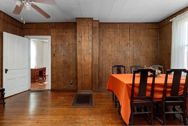105 Austin Ave, Staunton, VA 24401 - dining area featuring wooden walls, ceiling fan, and wood-type flooring