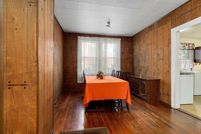 105 Austin Ave, Staunton, VA 24401 - dining area featuring wooden walls, wood-type flooring, and plenty of natural light