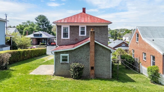 105 Austin Ave, Staunton, VA 24401 - rear view of house featuring a standing seam roof, a chimney, and metal roof