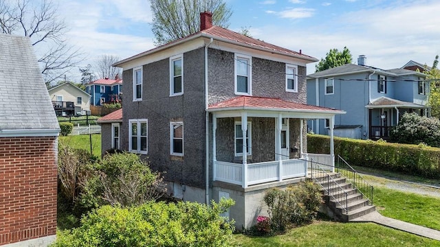 105 Austin Ave, Staunton, VA 24401 - american foursquare style home with a standing seam roof, covered porch, metal roof, a residential view, and a chimney
