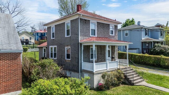 105 Austin Ave, Staunton, VA 24401 - american foursquare style home with a standing seam roof, covered porch, metal roof, a residential view, and a chimney