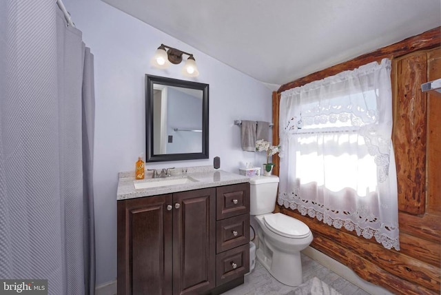  - bathroom with lofted ceiling, toilet, vanity, and a shower with curtain