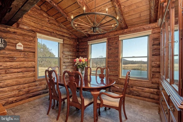  - dining space with wood ceiling, healthy amount of natural light, and log walls