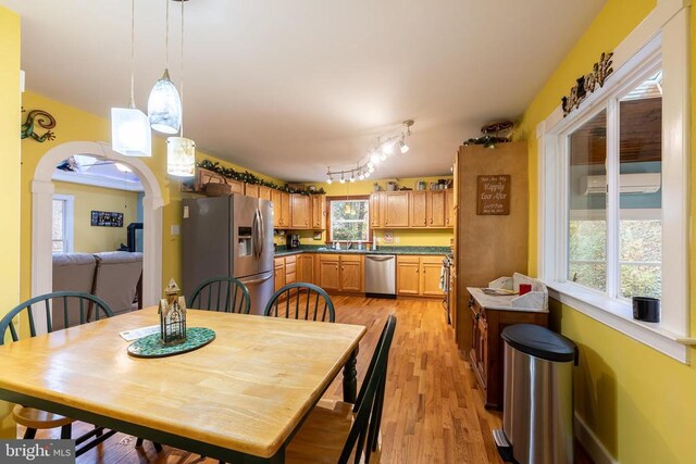 689 Mutton Hollow Rd, Stanardsville, VA 22973 - dining space featuring light wood finished floors and arched walkways