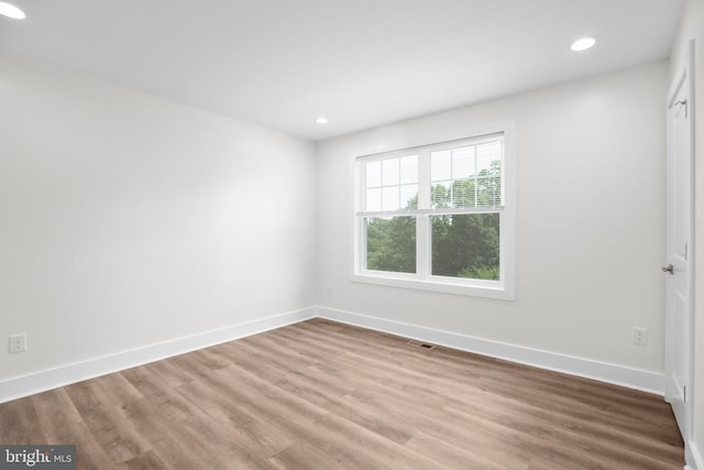 10302 Laurel Ridge Way, Fredericksburg, VA 22408 - spare room with wood finished floors, baseboards, and recessed lighting