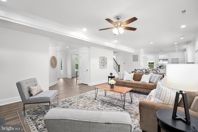 10302 Laurel Ridge Way, Fredericksburg, VA 22408 - living room featuring wood finished floors, crown molding, stairway, ceiling fan, and baseboards