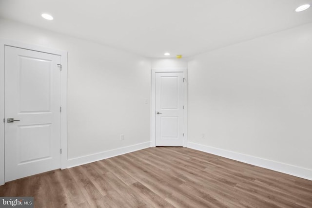 10302 Laurel Ridge Way, Fredericksburg, VA 22408 - empty room featuring wood finished floors, recessed lighting, and baseboards