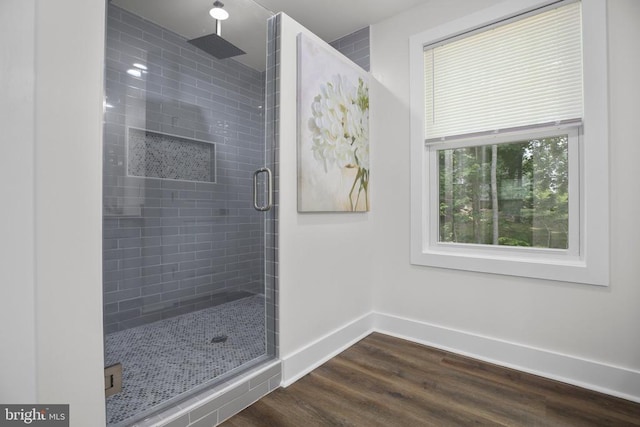 10302 Laurel Ridge Way, Fredericksburg, VA 22408 - bathroom featuring wood finished floors, baseboards, and a stall shower