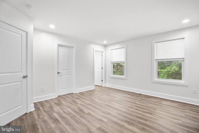 10302 Laurel Ridge Way, Fredericksburg, VA 22408 - unfurnished bedroom with wood finished floors, recessed lighting, and baseboards