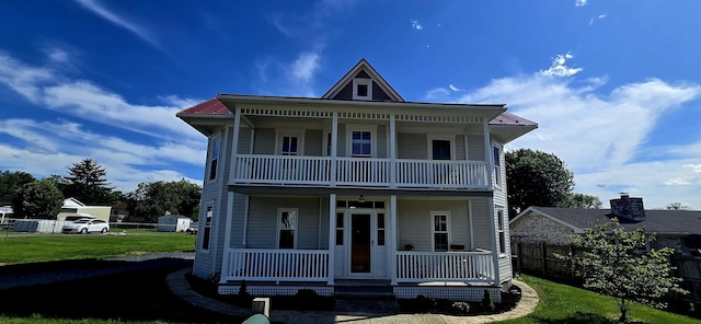 242 1st St, Broadway, VA 22815 - view of front of house with covered porch and a balcony