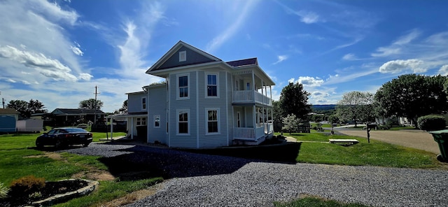 242 1st St, Broadway, VA 22815 - view of property exterior with a balcony and a yard