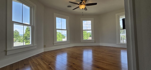242 1st St, Broadway, VA 22815 - spare room with wood-type flooring, healthy amount of natural light, and ceiling fan