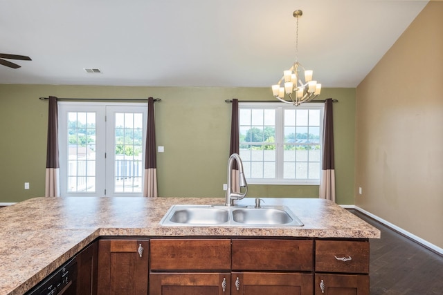 233 Overview St, Waynesboro, VA 22980 - kitchen with a chandelier, light countertops, dark wood-style flooring, pendant lighting, and a ceiling fan