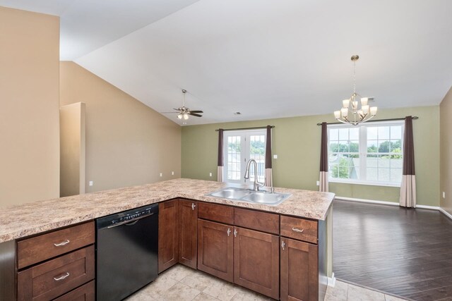 233 Overview St, Waynesboro, VA 22980 - kitchen with black dishwasher, light countertops, a chandelier, vaulted ceiling, and ceiling fan