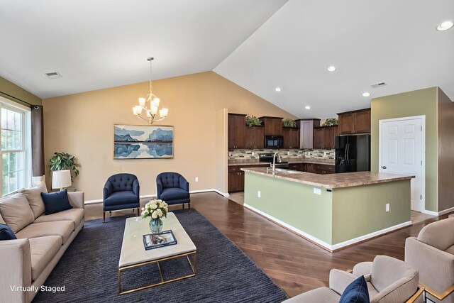 233 Overview St, Waynesboro, VA 22980 - living area with a chandelier, lofted ceiling, dark wood-style flooring, and recessed lighting