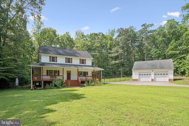 102 Oak Knoll Pl, Bumpass, VA 23024 - view of front facade featuring covered porch, an outbuilding, a detached garage, view of wooded area, and stairs