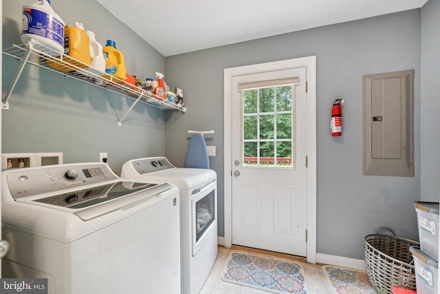 102 Oak Knoll Pl, Bumpass, VA 23024 - laundry area featuring electric panel, washer and dryer, and light tile patterned floors