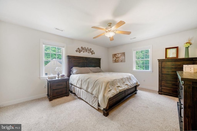 102 Oak Knoll Pl, Bumpass, VA 23024 - carpeted bedroom with baseboards and a ceiling fan