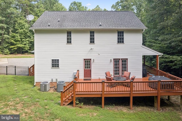 102 Oak Knoll Pl, Bumpass, VA 23024 - rear view of property featuring a wooden deck and a shingled roof