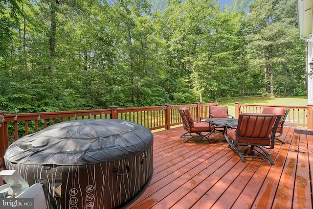 102 Oak Knoll Pl, Bumpass, VA 23024 - deck with area for grilling, outdoor dining area, and a wooded view