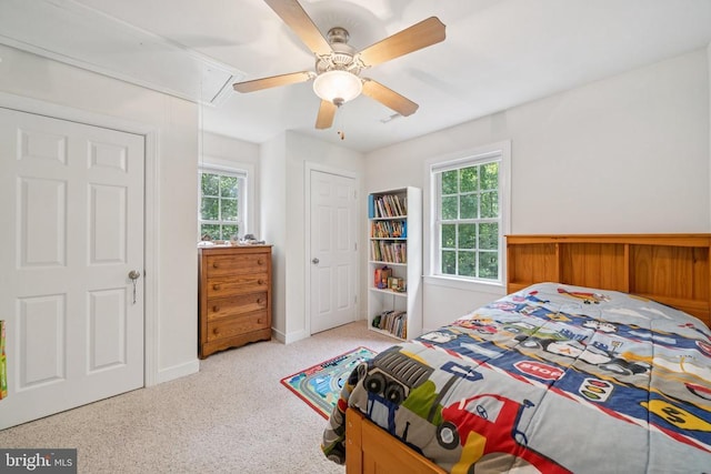 102 Oak Knoll Pl, Bumpass, VA 23024 - carpeted bedroom with attic access, multiple windows, and a ceiling fan