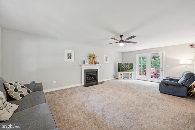102 Oak Knoll Pl, Bumpass, VA 23024 - carpeted living area with ceiling fan and a fireplace with flush hearth
