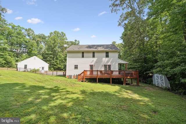 102 Oak Knoll Pl, Bumpass, VA 23024 - rear view of house with a wooden deck and a storage shed