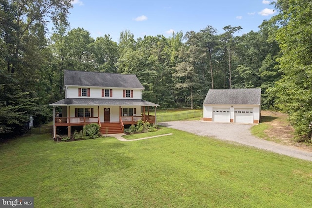 102 Oak Knoll Pl, Bumpass, VA 23024 - view of front facade featuring a porch, an outdoor structure, driveway, and a forest view