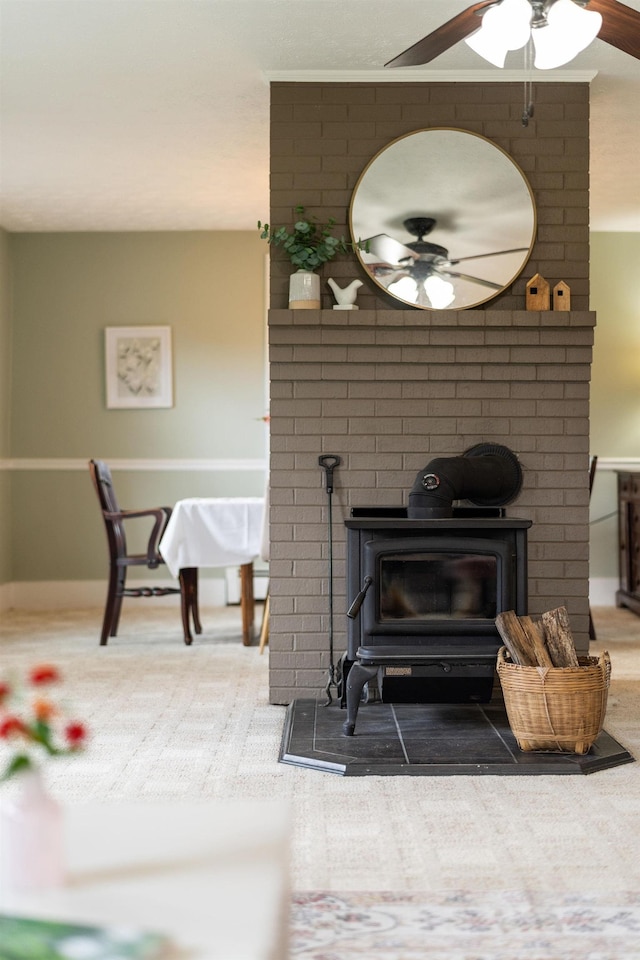199 Hermitage Rd, Staunton, VA 24401 - detailed view of ceiling fan, a wood stove, and baseboards
