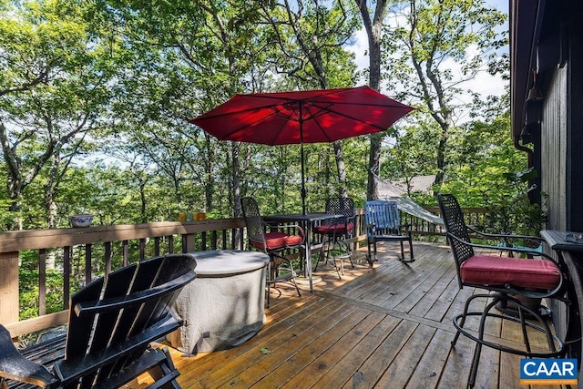 127 Blackrock Cir, Roseland, VA 22967 - deck with outdoor dining area and view of scattered trees