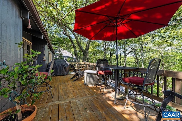 127 Blackrock Cir, Roseland, VA 22967 - wooden deck with outdoor dining area and a grill