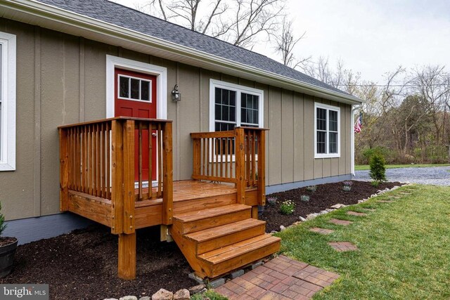 147 Fishermans Ln, Luray, VA 22835 - property entrance with a shingled roof, a wooden deck, and a yard
