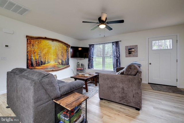 147 Fishermans Ln, Luray, VA 22835 - living area featuring light wood-type flooring, plenty of natural light, ceiling fan, and baseboards
