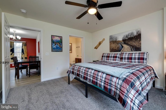 147 Fishermans Ln, Luray, VA 22835 - bedroom with a chandelier, carpet floors, baseboards, ensuite bathroom, and a ceiling fan