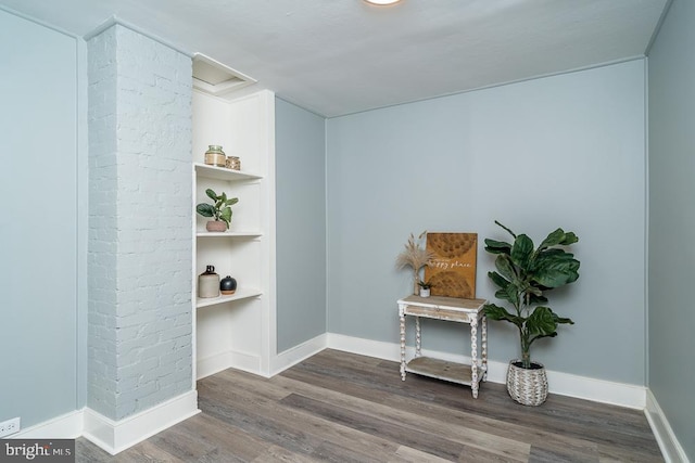1121 Monacan Trail Rd, Charlottesville, VA 22903 - living area featuring attic access, wood finished floors, baseboards, and built in shelves