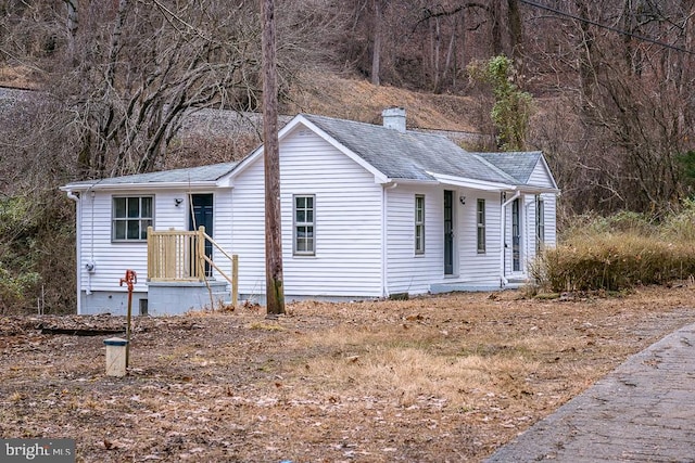 1121 Monacan Trail Rd, Charlottesville, VA 22903 - ranch-style home featuring roof with shingles and a chimney