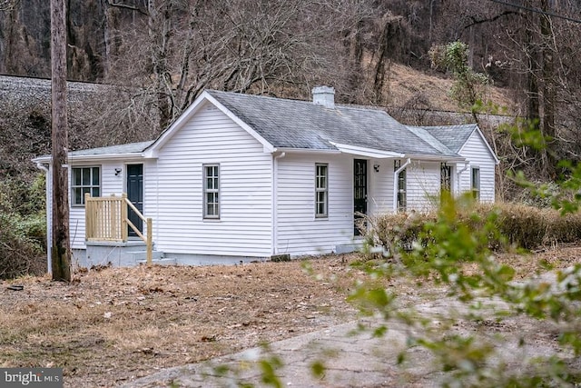 1121 Monacan Trail Rd, Charlottesville, VA 22903 - single story home featuring roof with shingles and a chimney