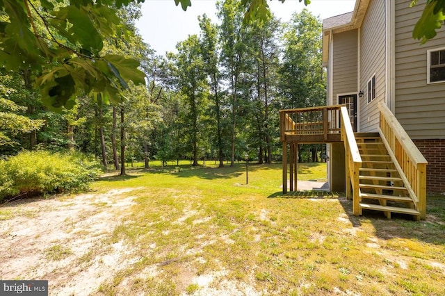 9937 Talley Rd, Spotsylvania, VA 22553 - view of grassy yard with stairs and a wooden deck