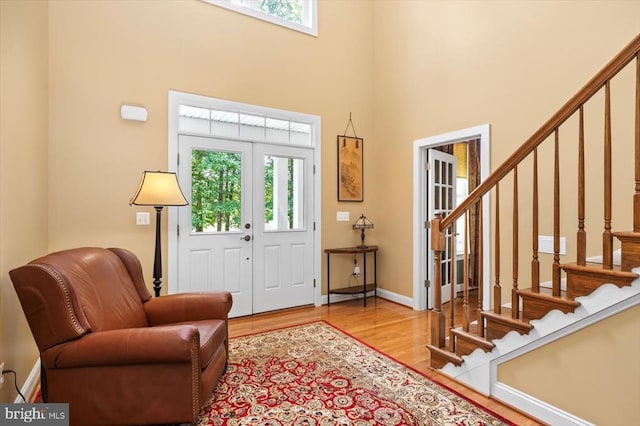 9937 Talley Rd, Spotsylvania, VA 22553 - foyer entrance featuring wood finished floors, a high ceiling, and stairway