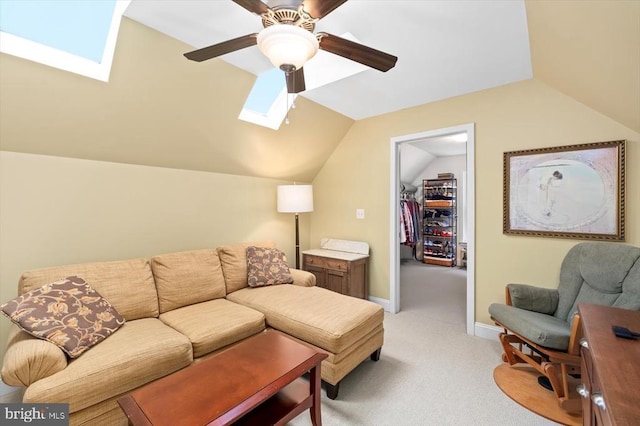 9937 Talley Rd, Spotsylvania, VA 22553 - living room with a skylight, light colored carpet, ceiling fan, and lofted ceiling